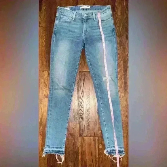 LEVIS Premium 711 Mid Rise Skinny Jean with Raw Hem in Light Wash - Picture 2 of 13